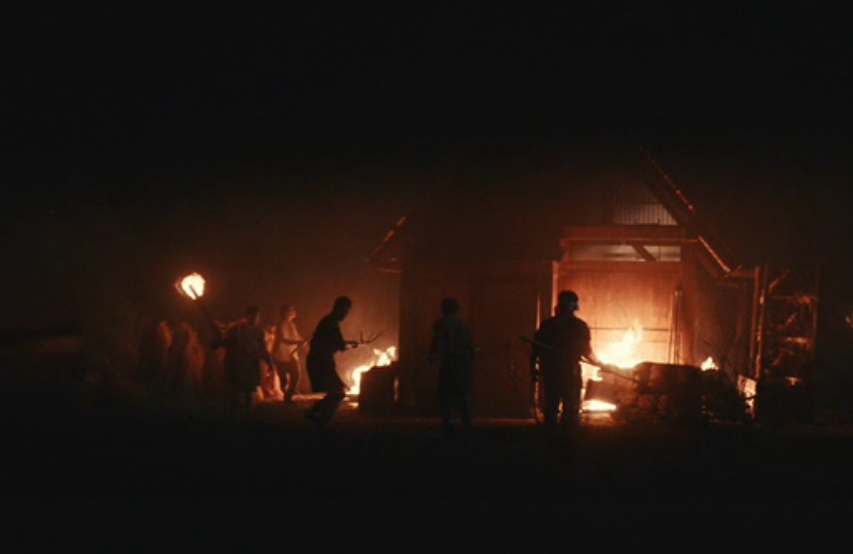 Japanese mob torching a barn where Korean escapees are hiding