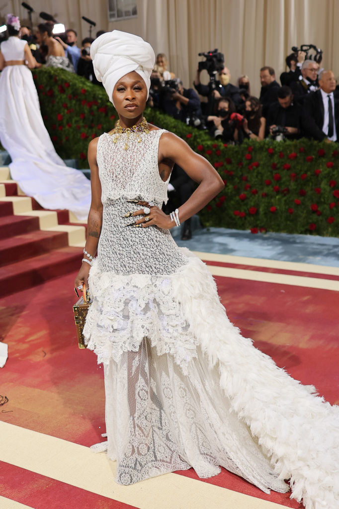 Cynthia Erivo in a gown with a train and a matching headdress