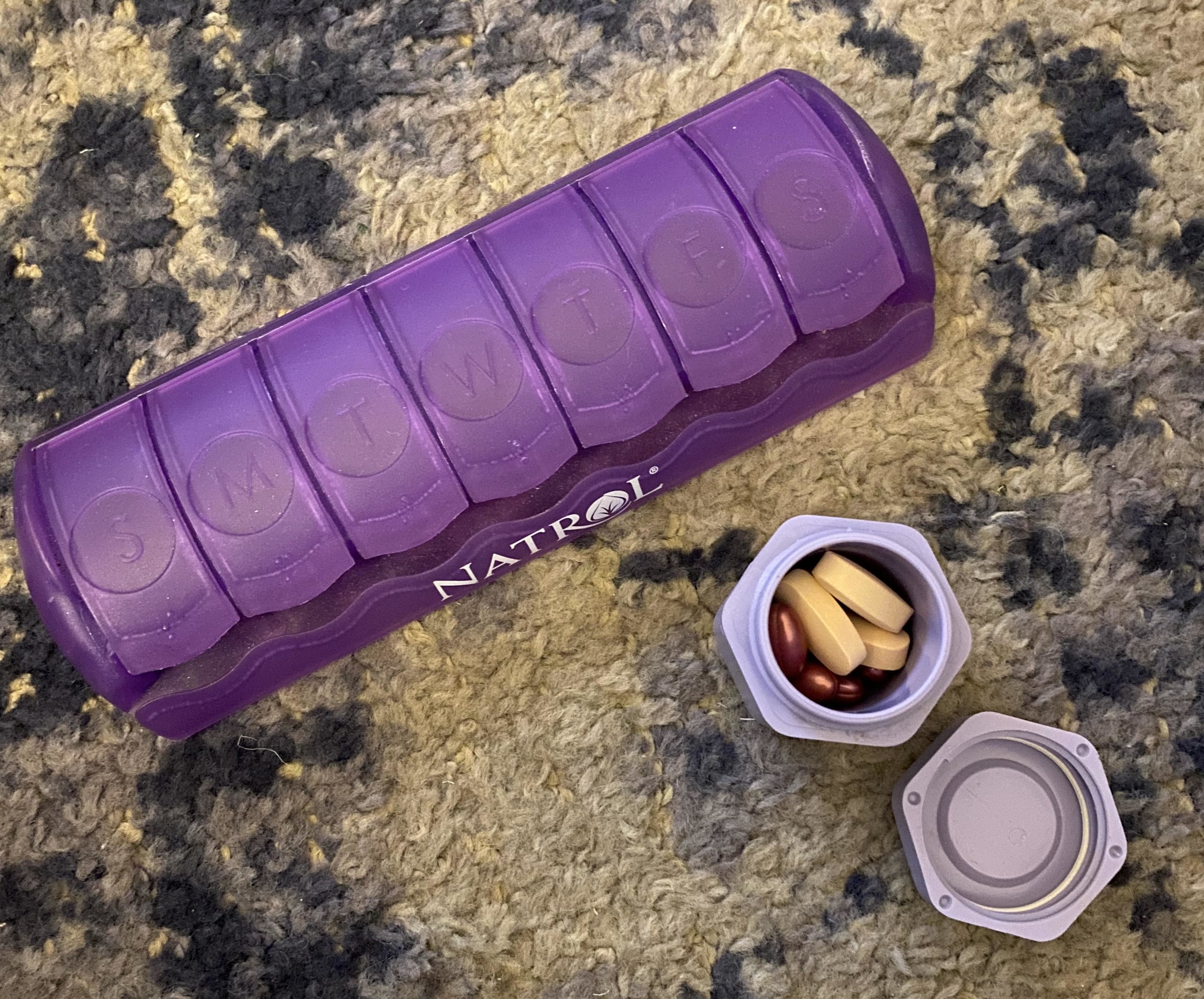 large pill box and then small container for pills