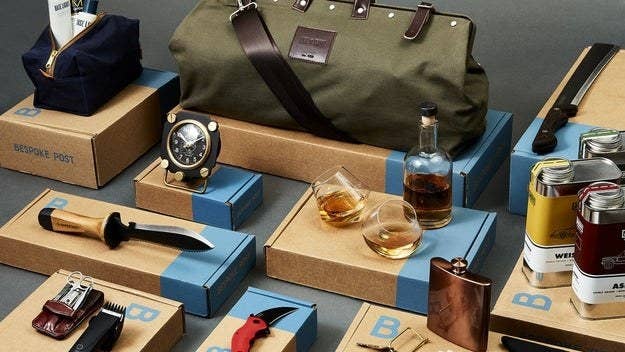 Bespoke Post products including a clock, electric razor, wine glasses, flask, duffel bag, zippered pouch, and more