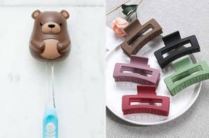 Toothbrush head holder in the shape of a bear and five large clips on a plate