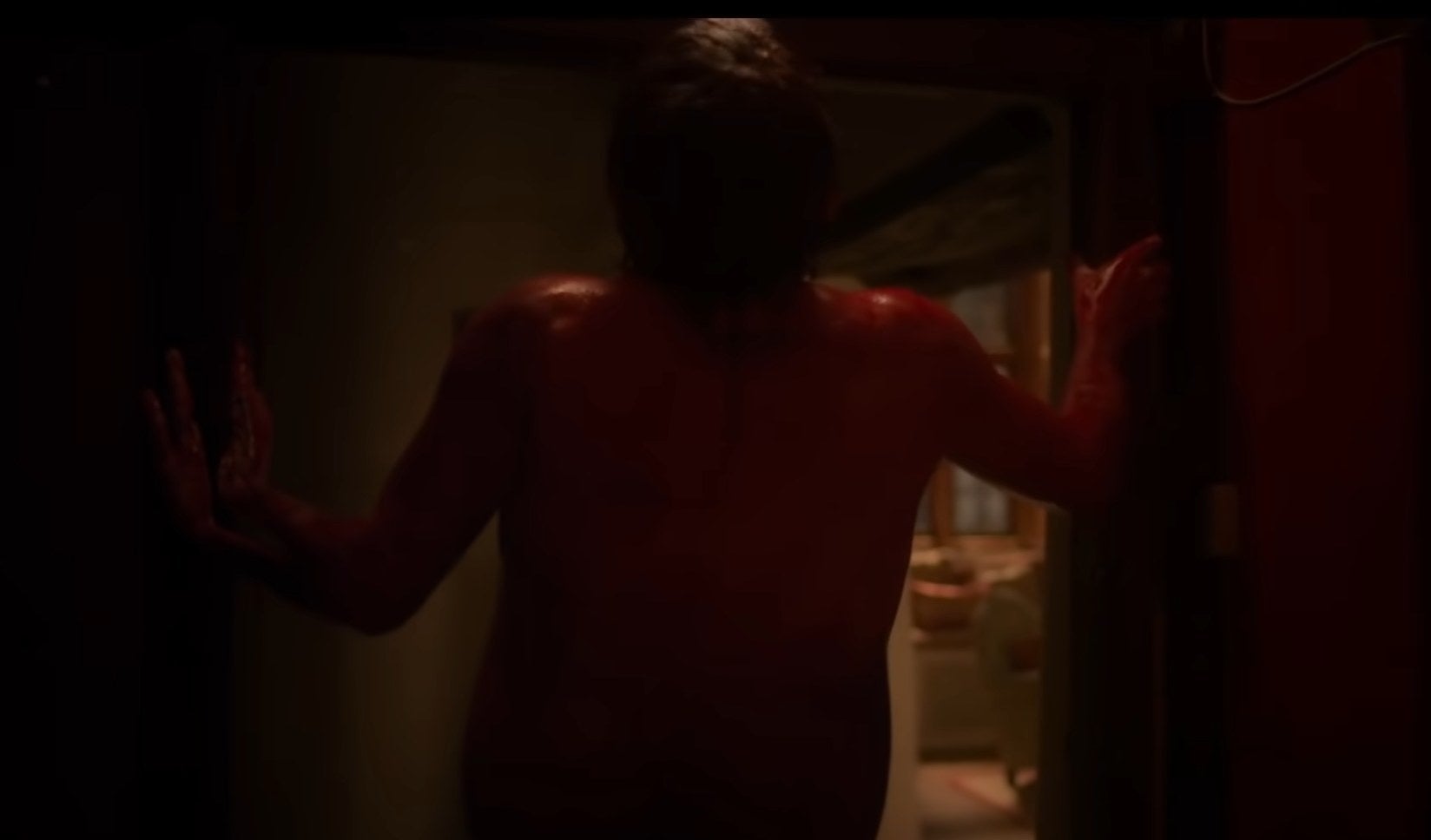 Geoffrey covered in blood in "Men"