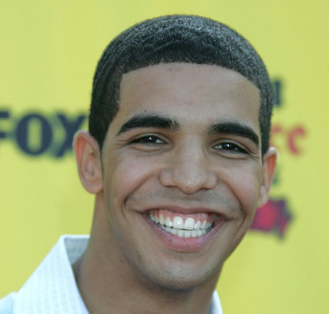 Drake with a wide smile