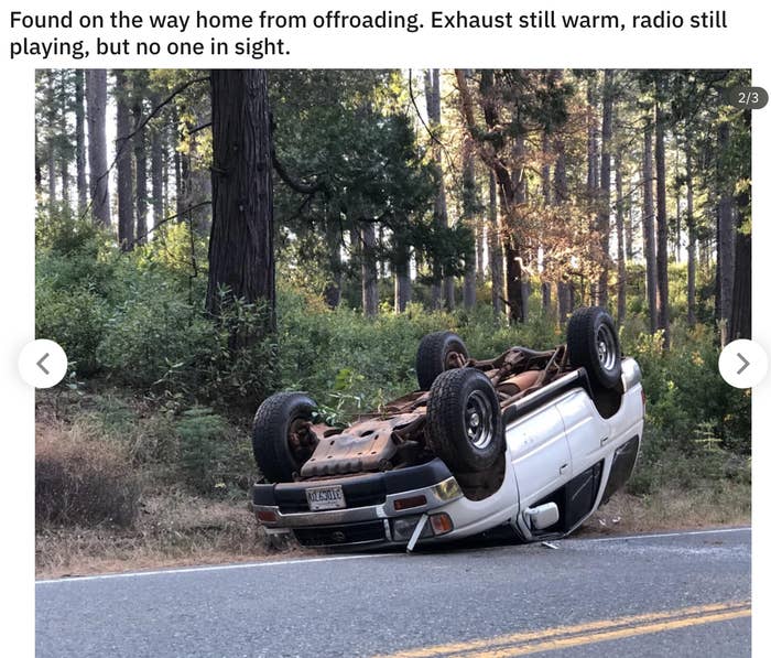 An overturned car on the side of the road with no one in sight but the radio playing