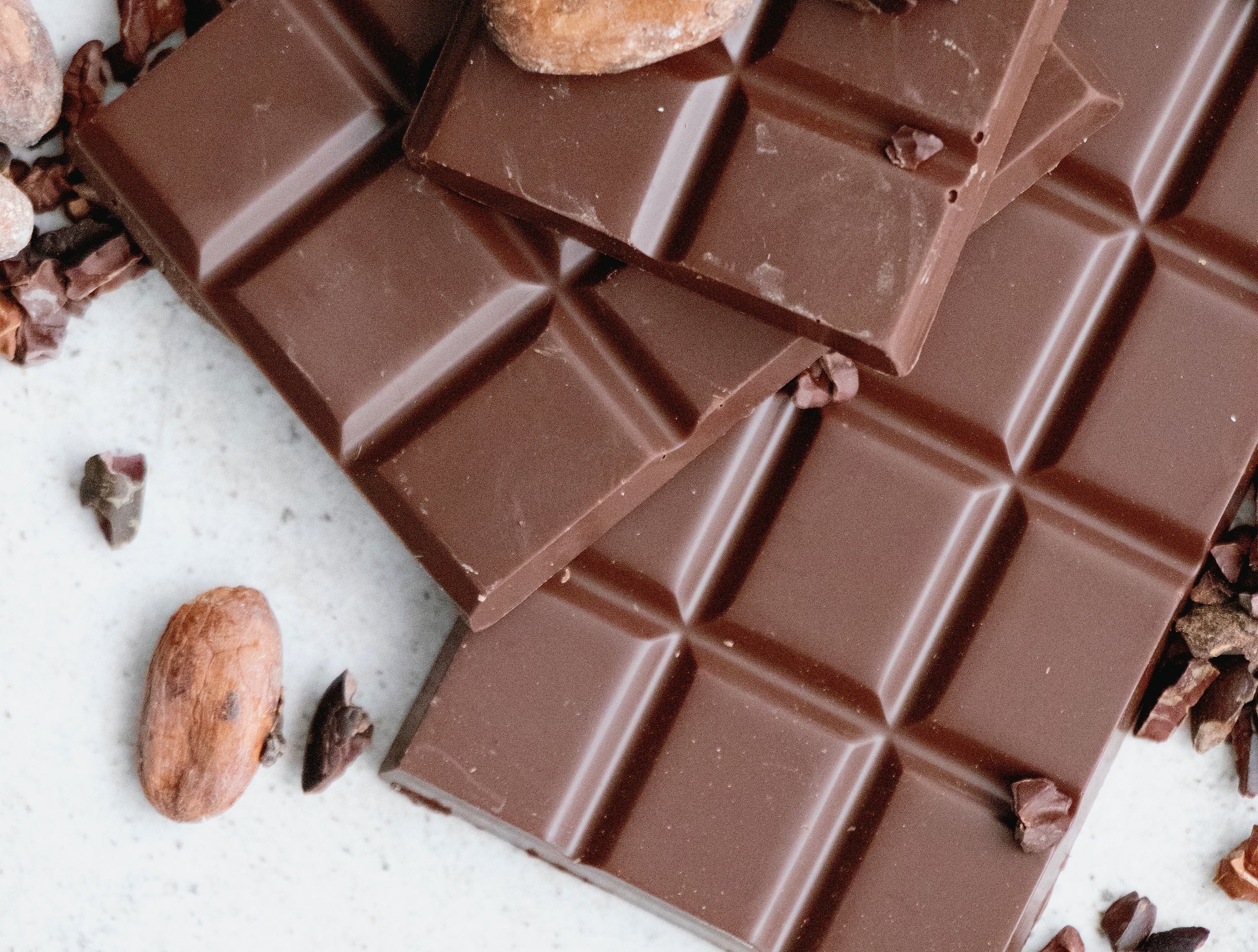 Chocolate bars and cacao beans