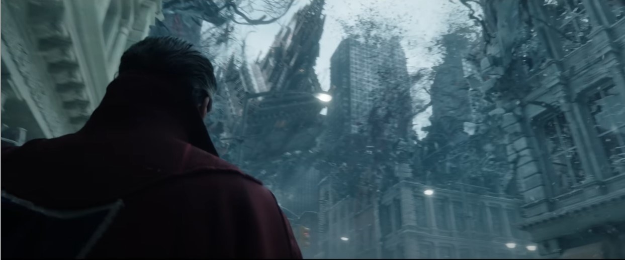 A shot of Doctor Strange from behind, as buildings fold in in front of him during an incursion