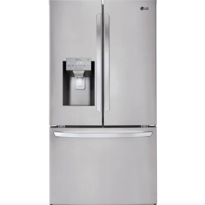the stainless steel refrigerator with its doors closed