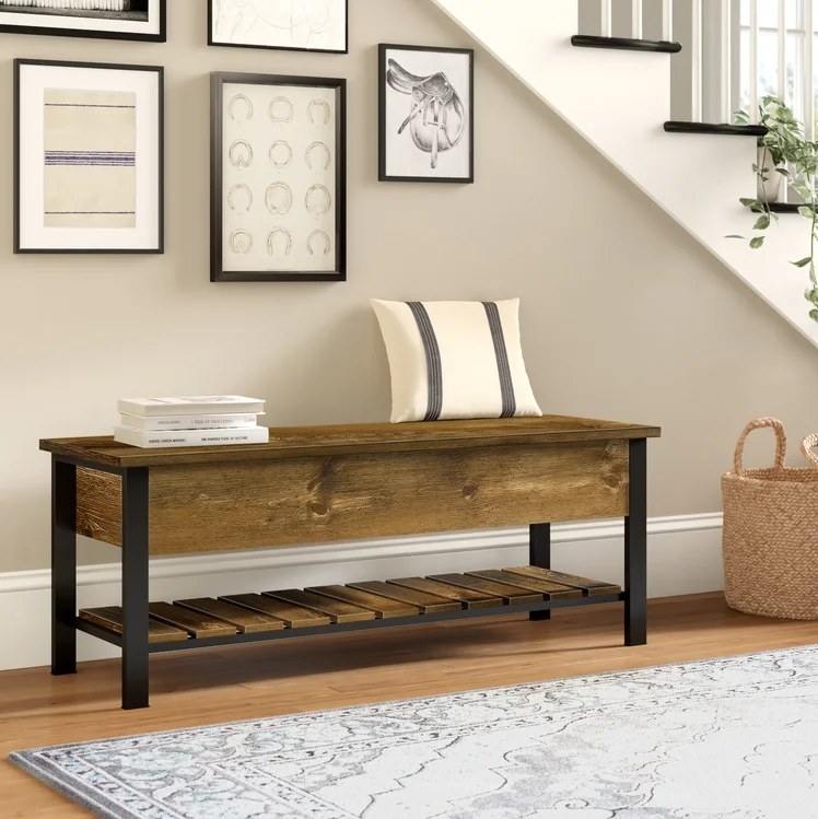 An image of barn wood flip-top storage bench with a weight capacity of 200 pounds