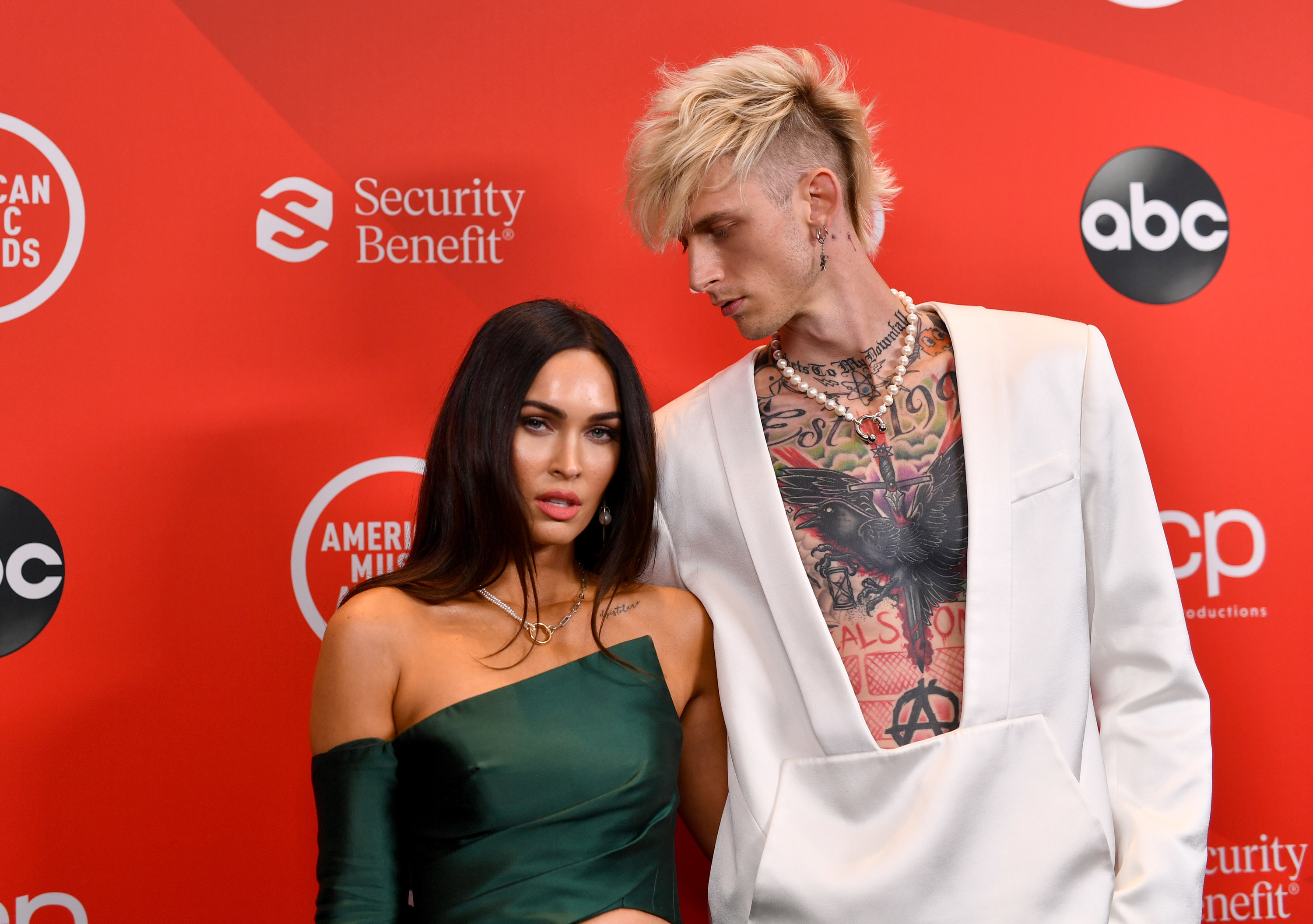A close-up of MGK and Megan on the red carpet