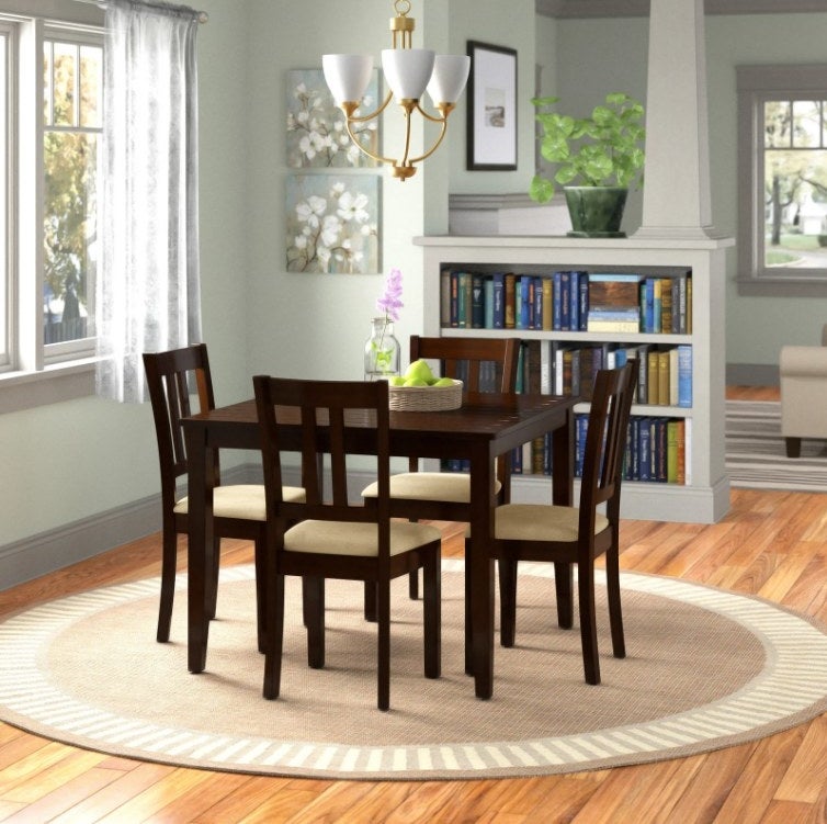 An image of a espresso four-person dining set that includes four chairs and a dining table
