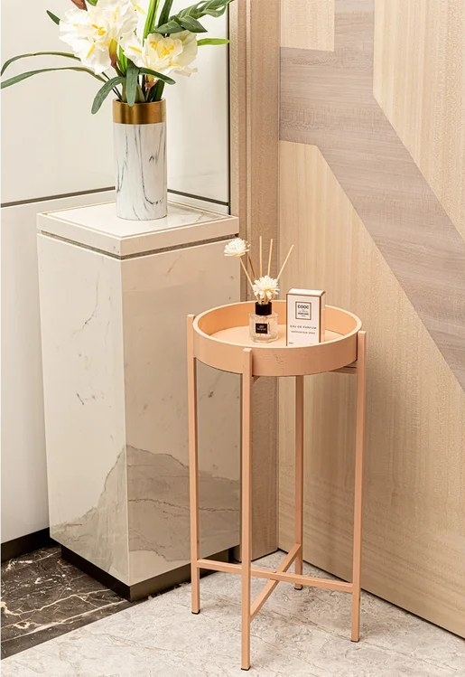 An image of a pink tall tray top end table