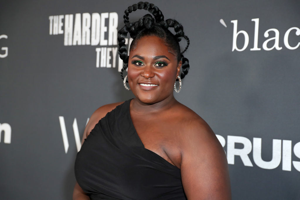 Danielle Brooks smiles at an event