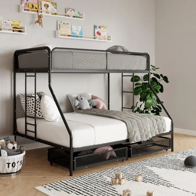 An image of a standard twin over full bunkbed with guardrails, built-in ladder, and slat kit included