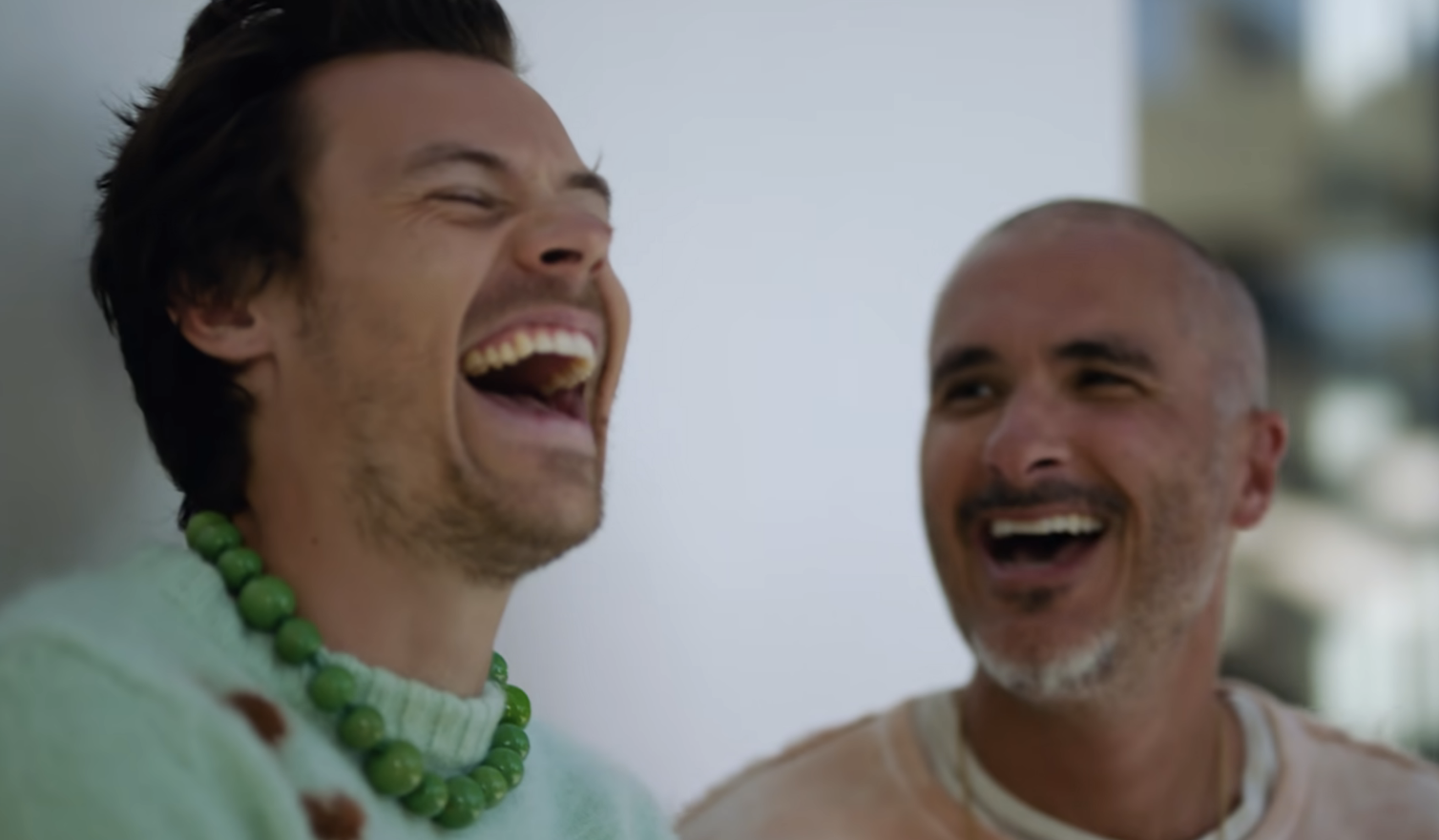 Styles laughing with Zane Lowe