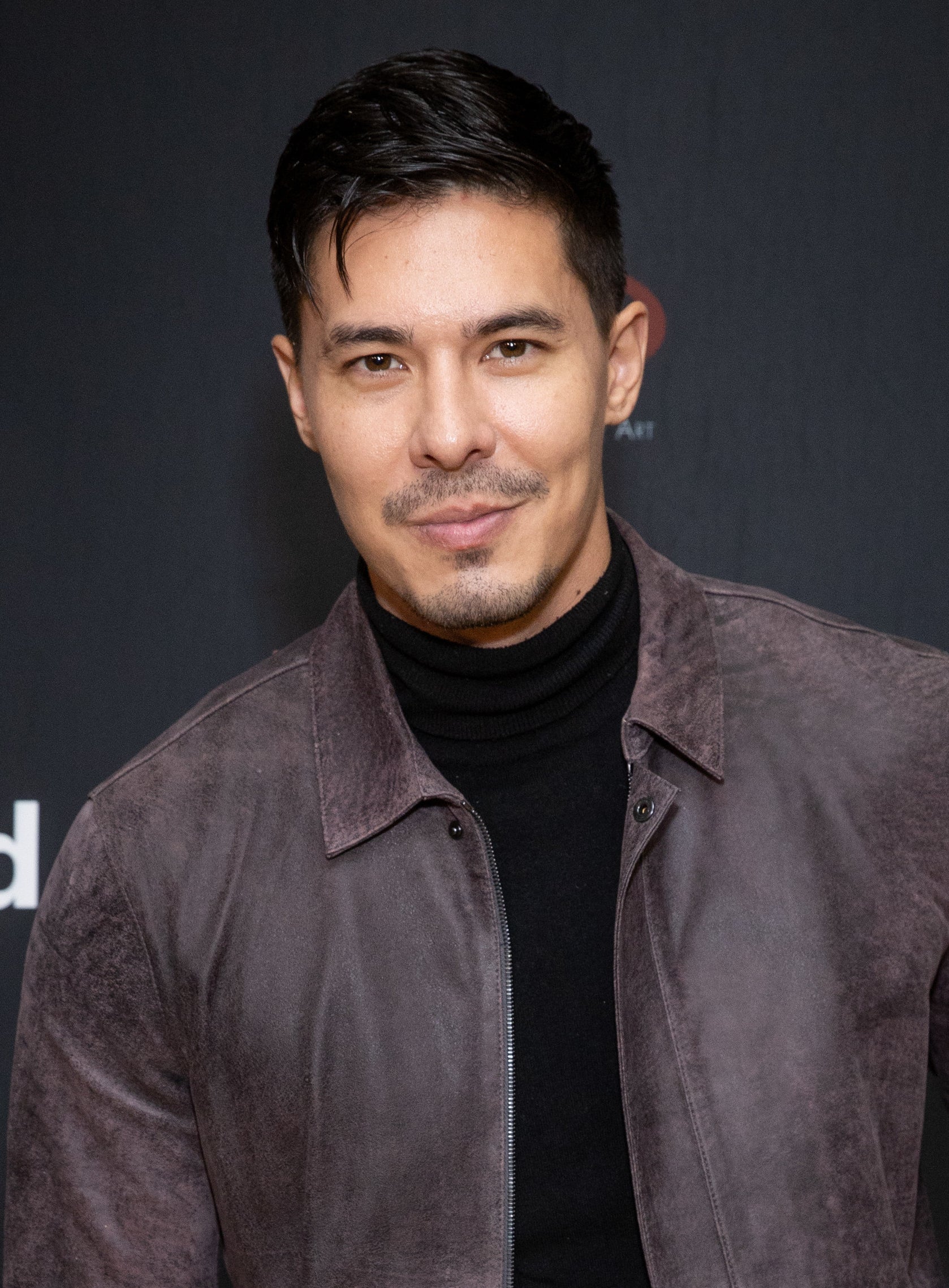 Lewis Tan at an event