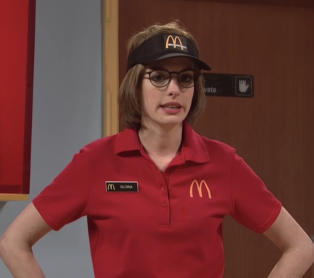 Anne Hathaway playing a McDonald&#x27;s employee