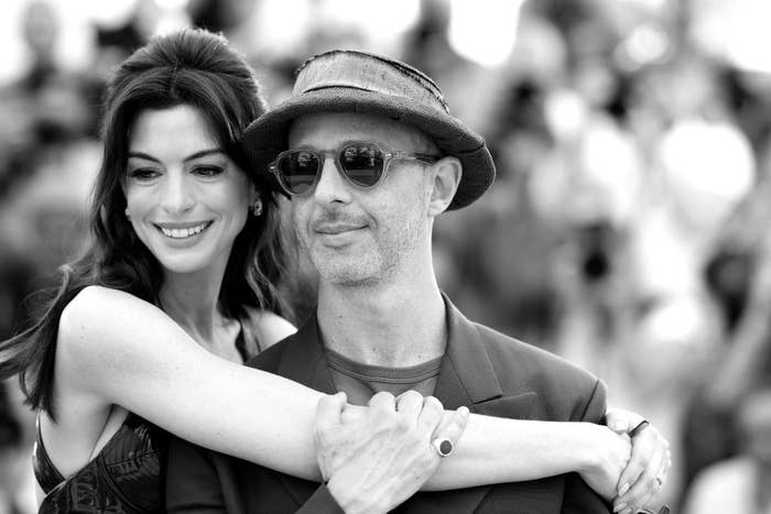 Anne Hathaway Wore Schiaparelli, Louis Vuitton & Valentino During