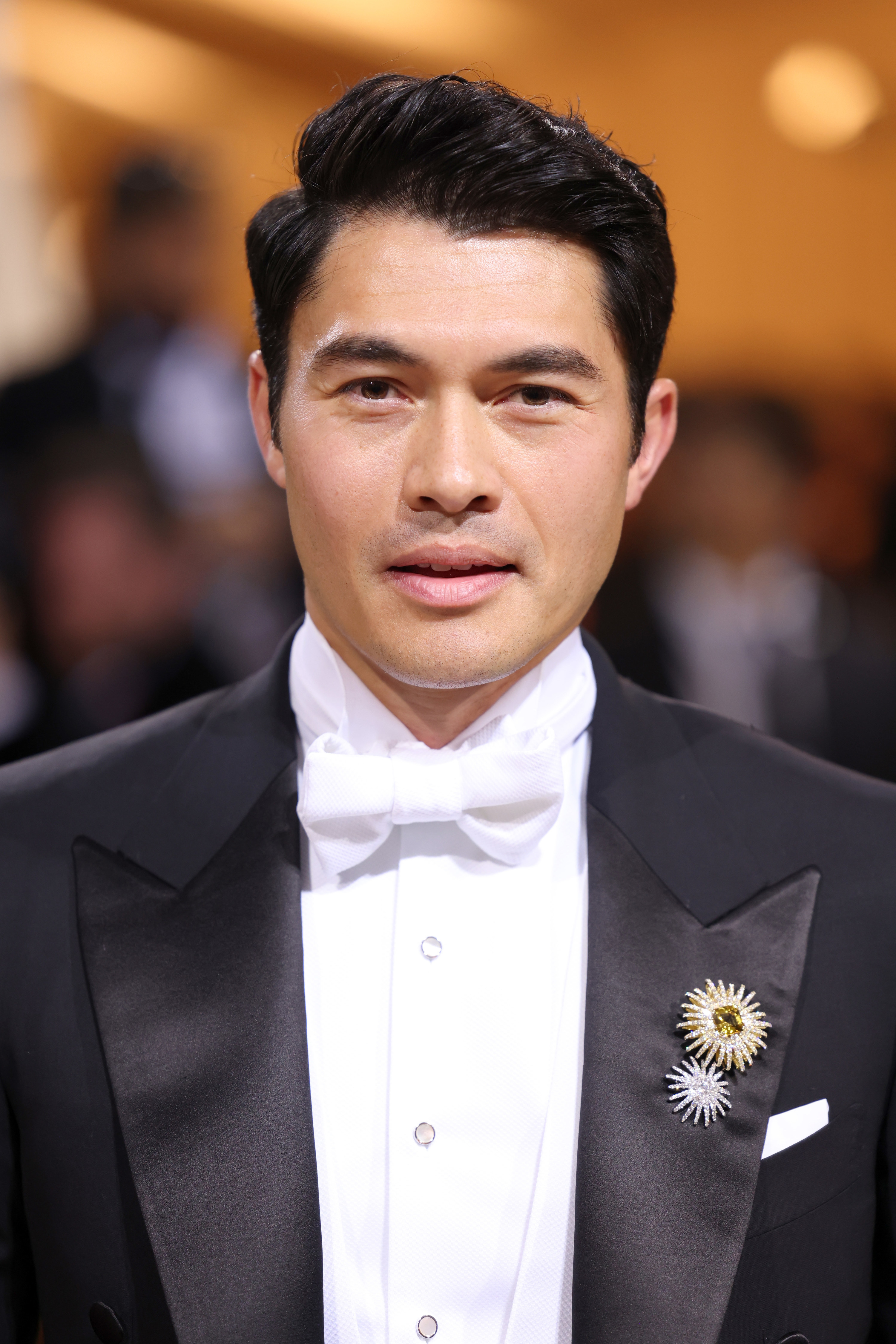 Henry Golding in a tux