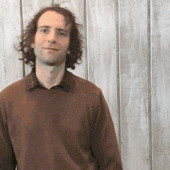 Kyle Mooney posing for a photoshoot with The Hollywood Reporter