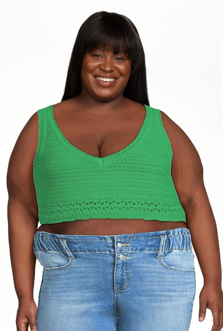 model wearing the crochet crop top in green