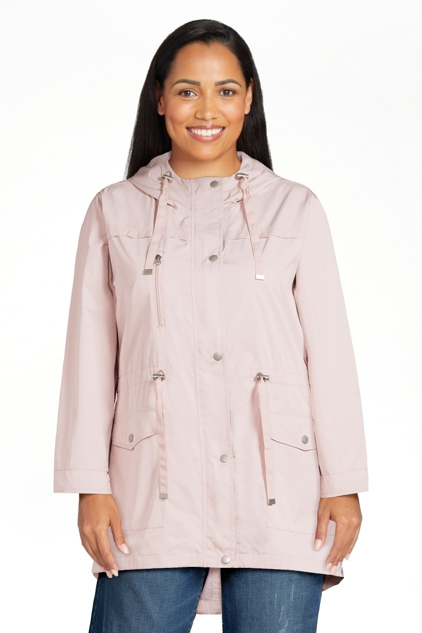 model wearing the jacket in pink