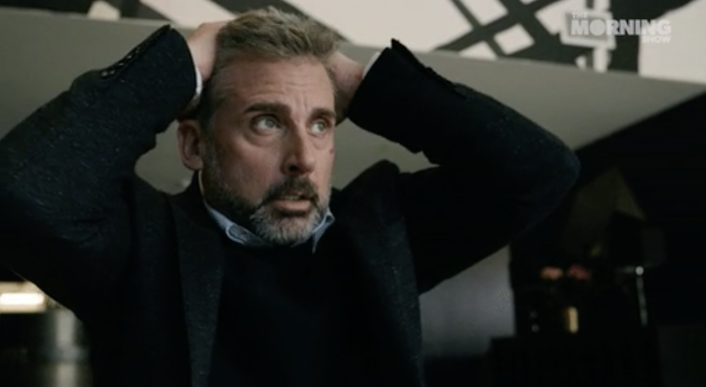 Steve Carell looking stressed with his hands in his hair
