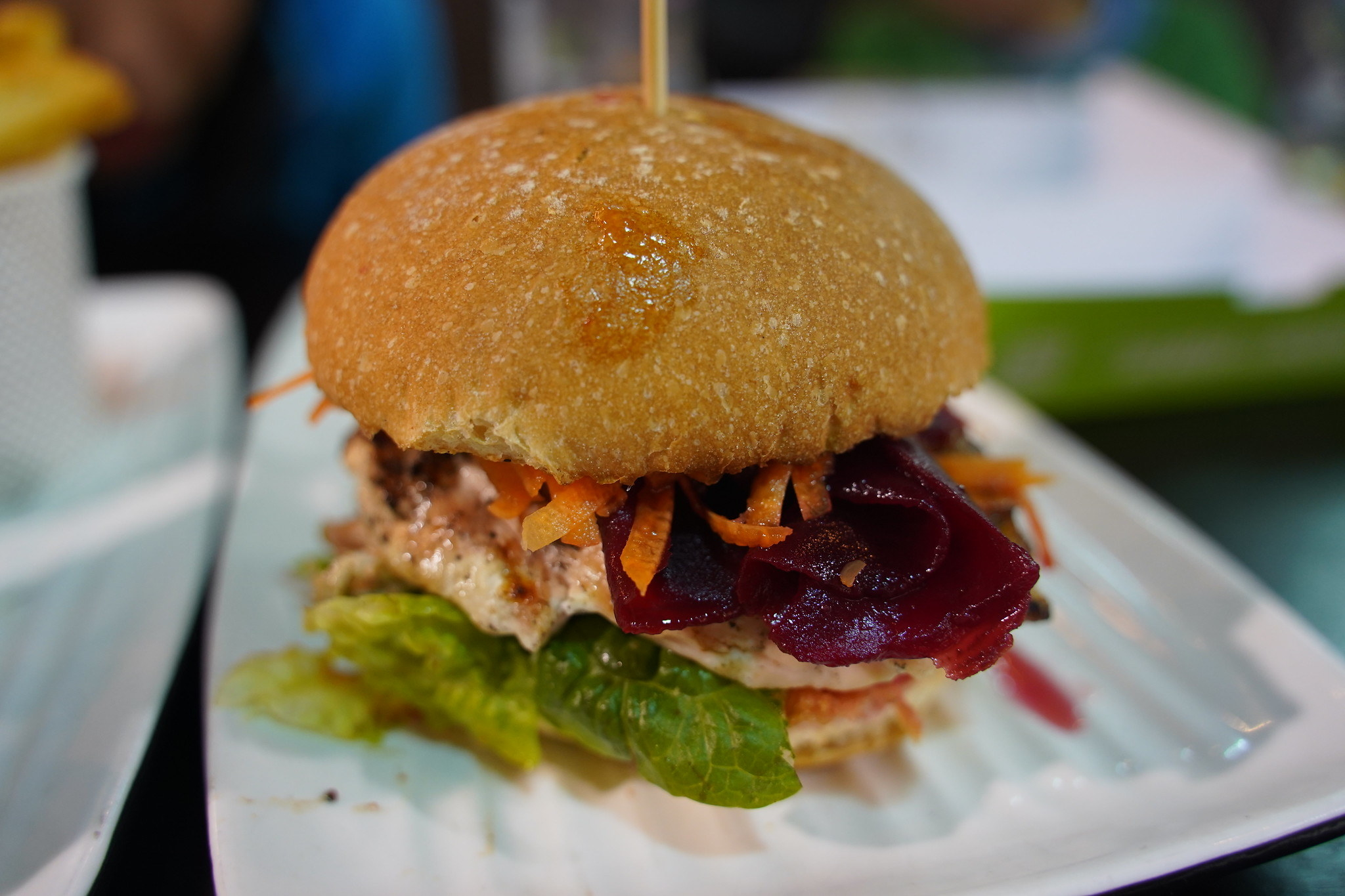 A burger containing beetroot