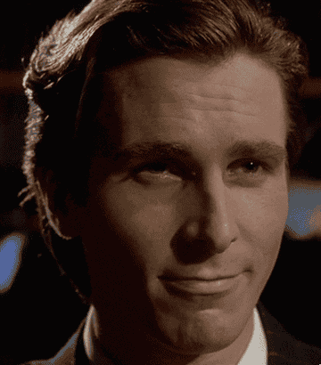 Gif of Christian Bale in &quot;American Psycho&quot; making an &quot;Oooooh&quot; expression