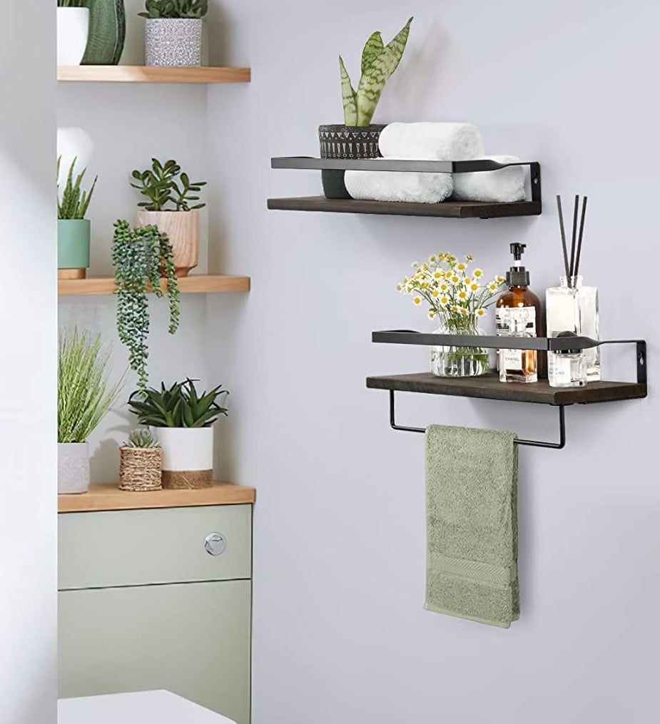 two stylish floating shelves on a wall in a bathroom