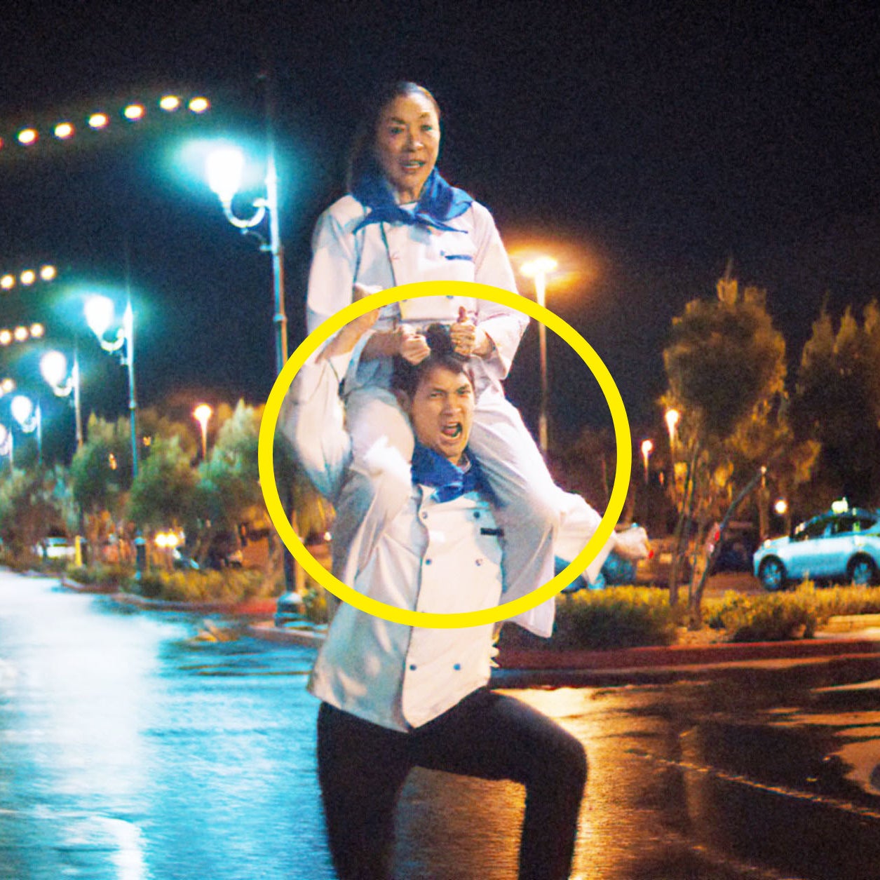 Harry carries Michelle on his shoulders as they walk outside at night