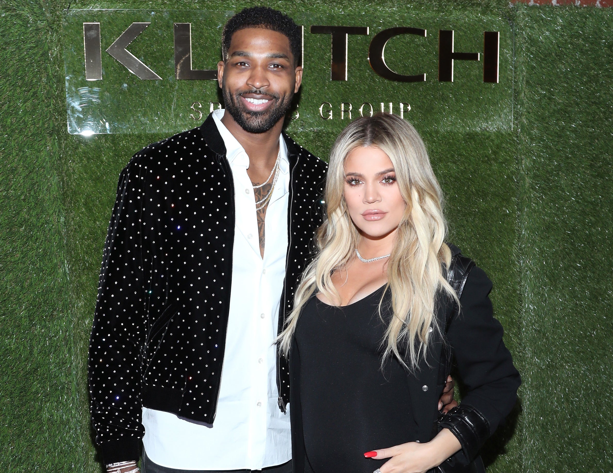 Tristan and Khloe pose together at an event