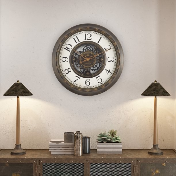 The wall clock perched above hall table with hands pointed at the 10 and 2