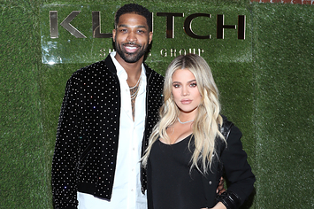 Tristan and Khloe pose together at an event