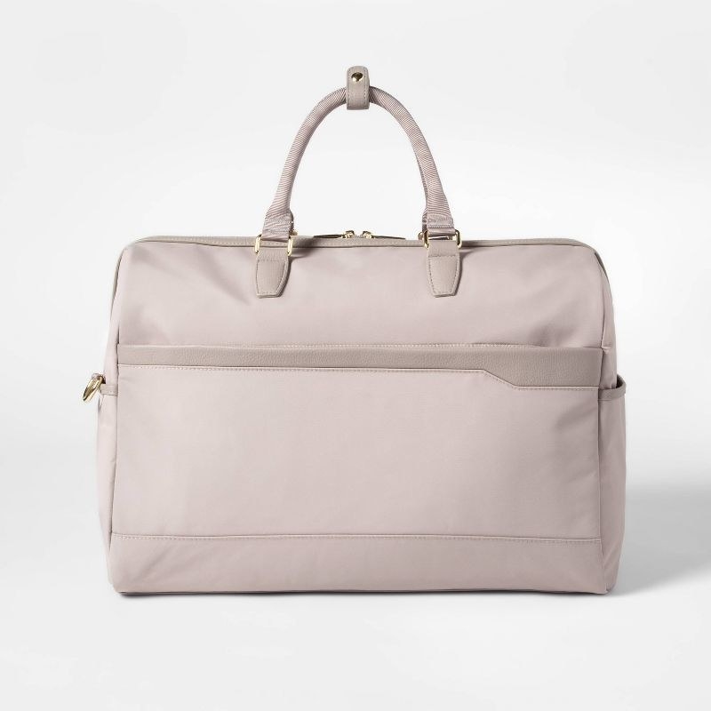 An image of a taupe weekender bag