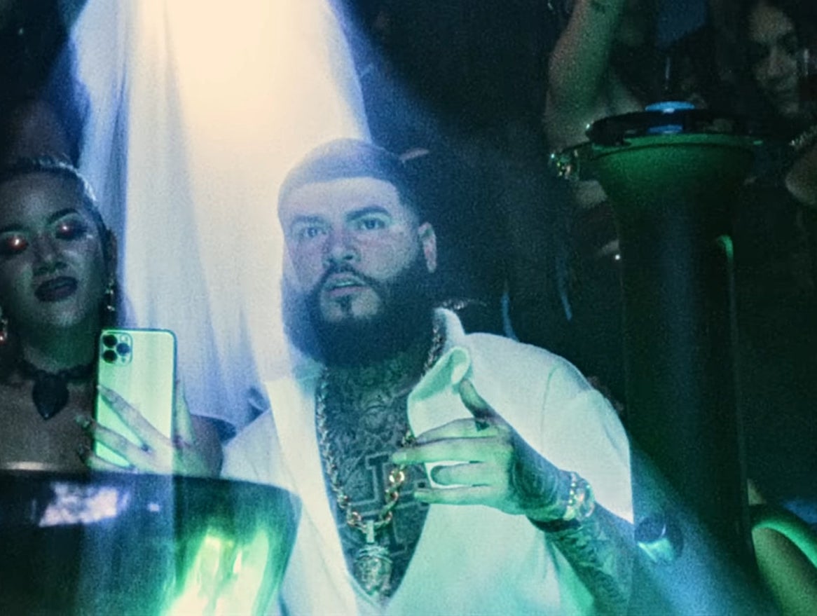 Farruko with a beard and mustache