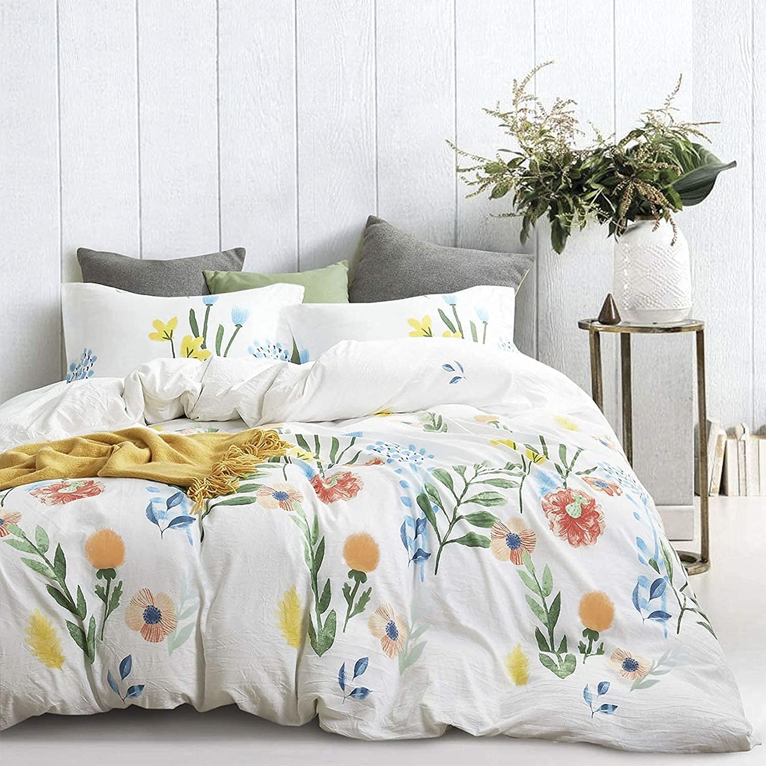 a floral bed set in a bright room