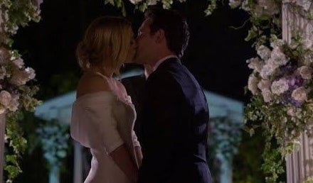 JJ and will kissing at the alter