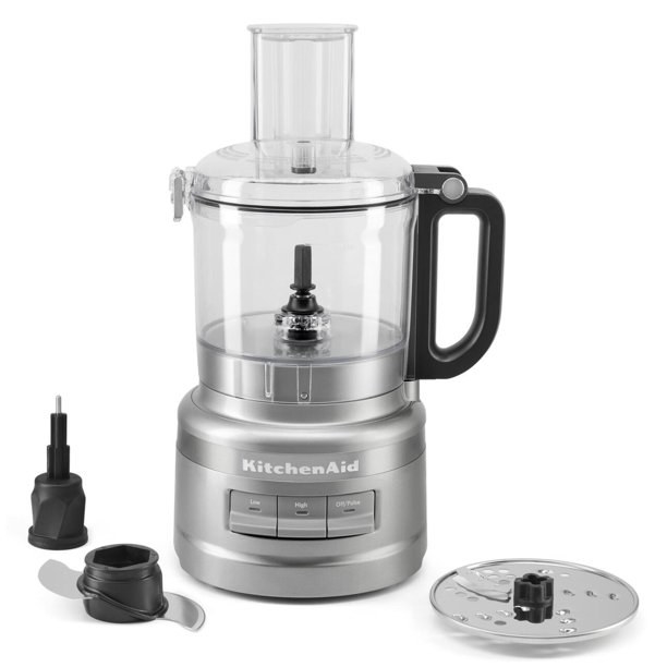 the silver food processor with several blade attachments