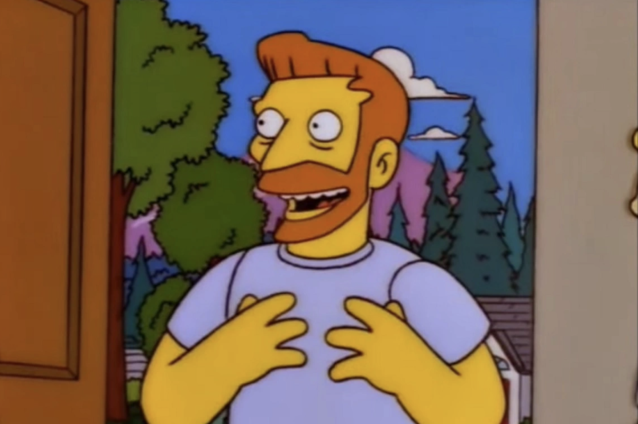 Hank Scorpio, with a red beard and hair, stands in a doorway looking excited