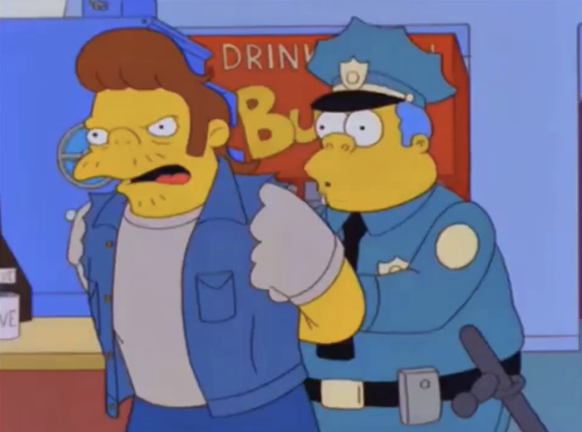 Snake, wearing a denim vest, is being put into handcuffs by Police Chief Wiggum