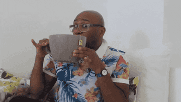 RobertEBlackmon sipping from an overly large cup of tea