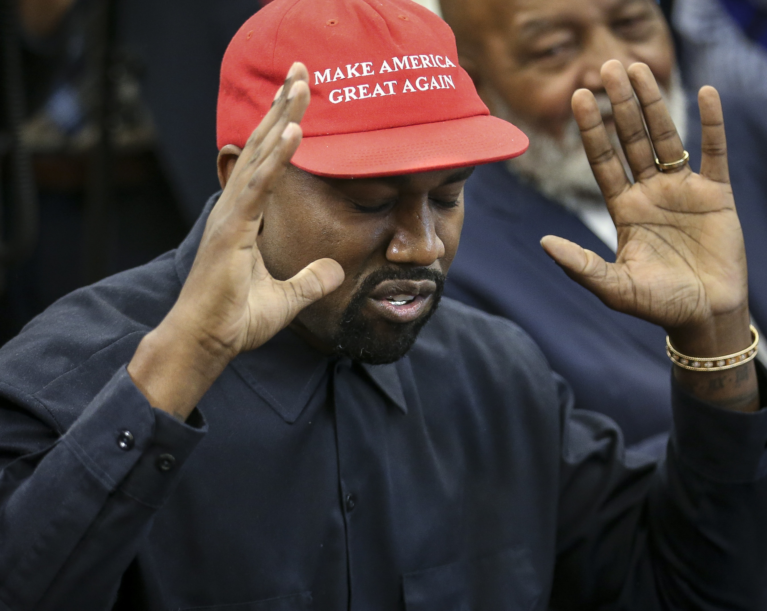 Kanye wears a MAGA hat