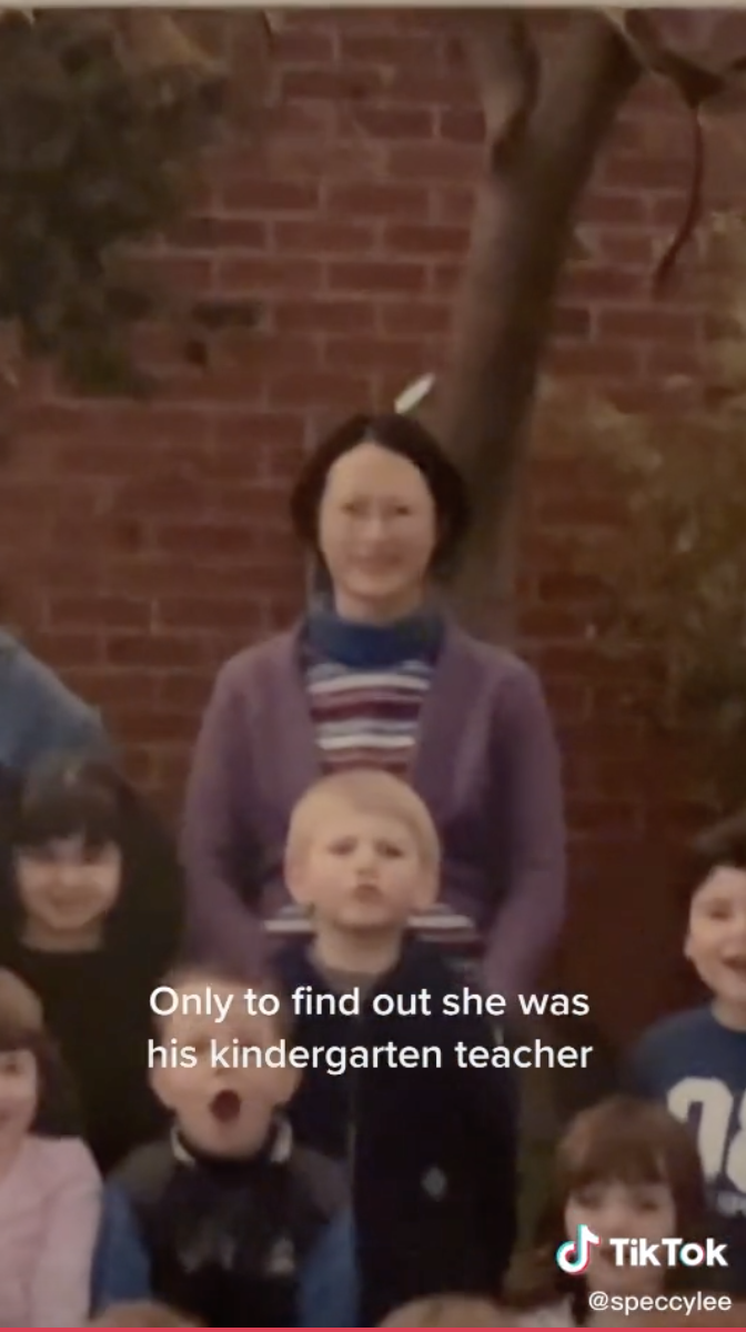 A class photo showing a young Tomas standing in front of Leah&#x27;s mother