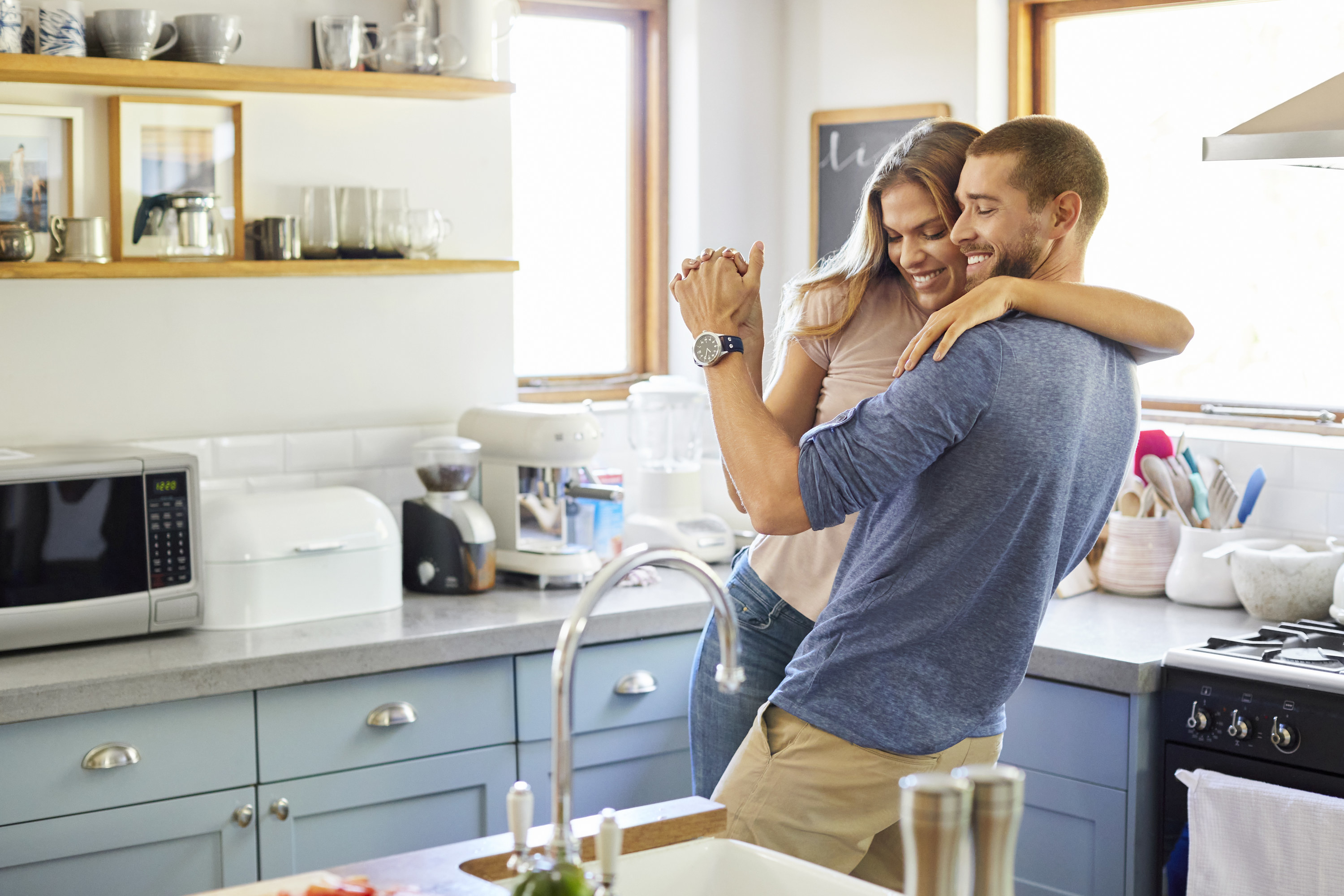 Couple dancing in the kitchen