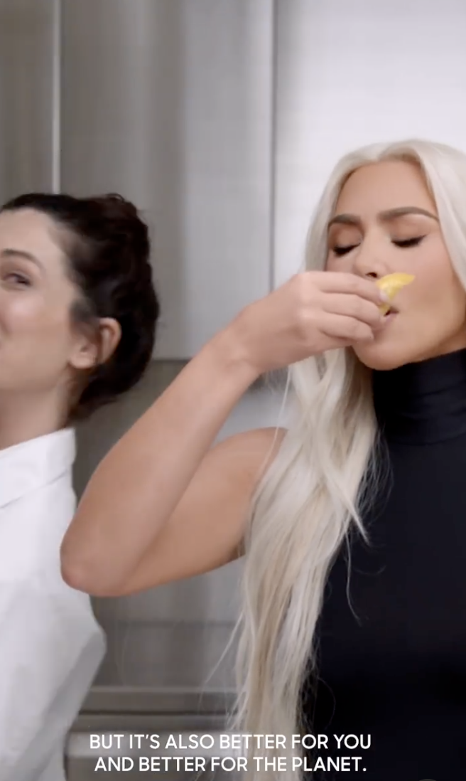 Kim holds up a tortilla to her mouth in this promotional video, with the caption reading &quot;but it&#x27;s also better for you and better for the planet&quot;