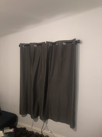 grey blackout curtains on a window