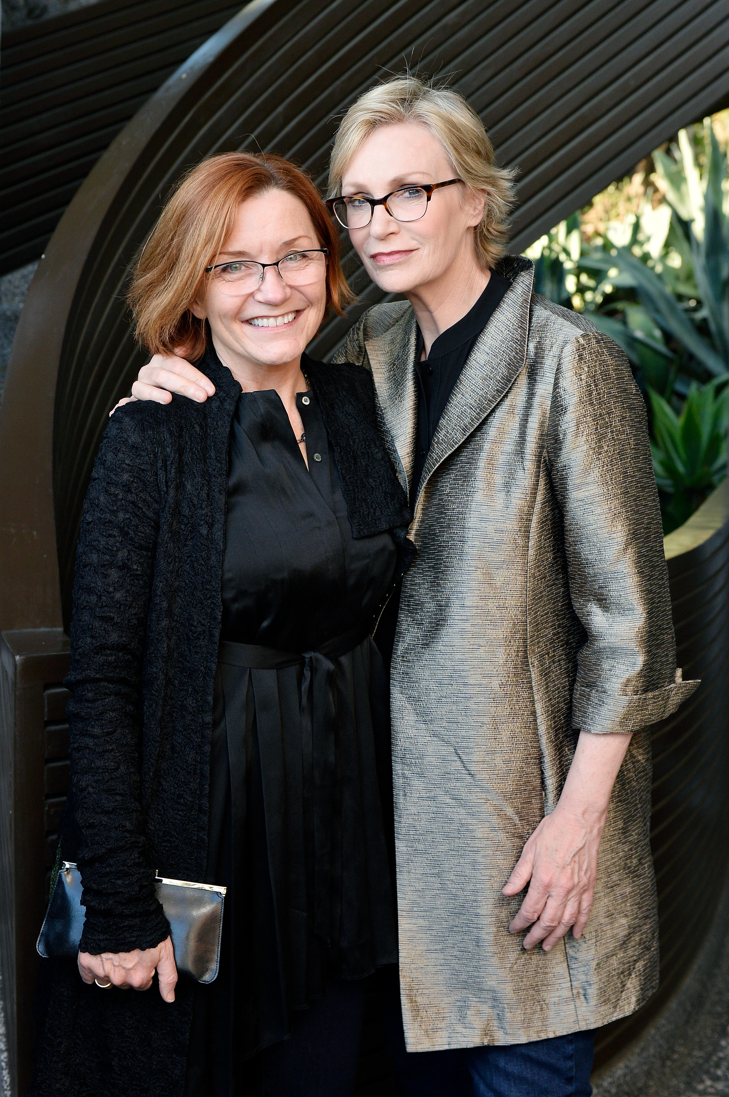 Jennifer Cheyne and Jane Lynch at a formal event