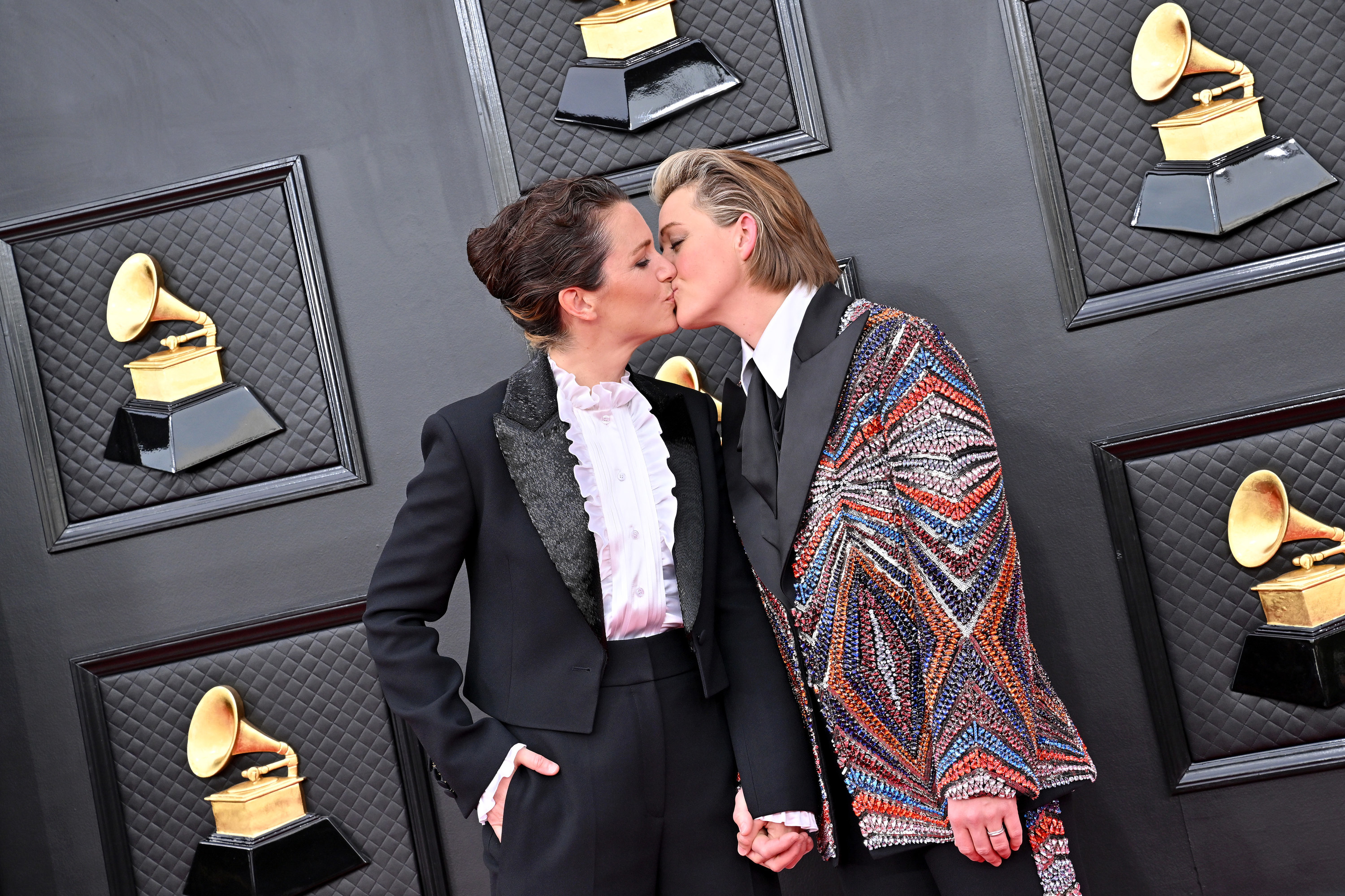 Brandi Carlile and Catherine Shepherd kiss at the Grammys