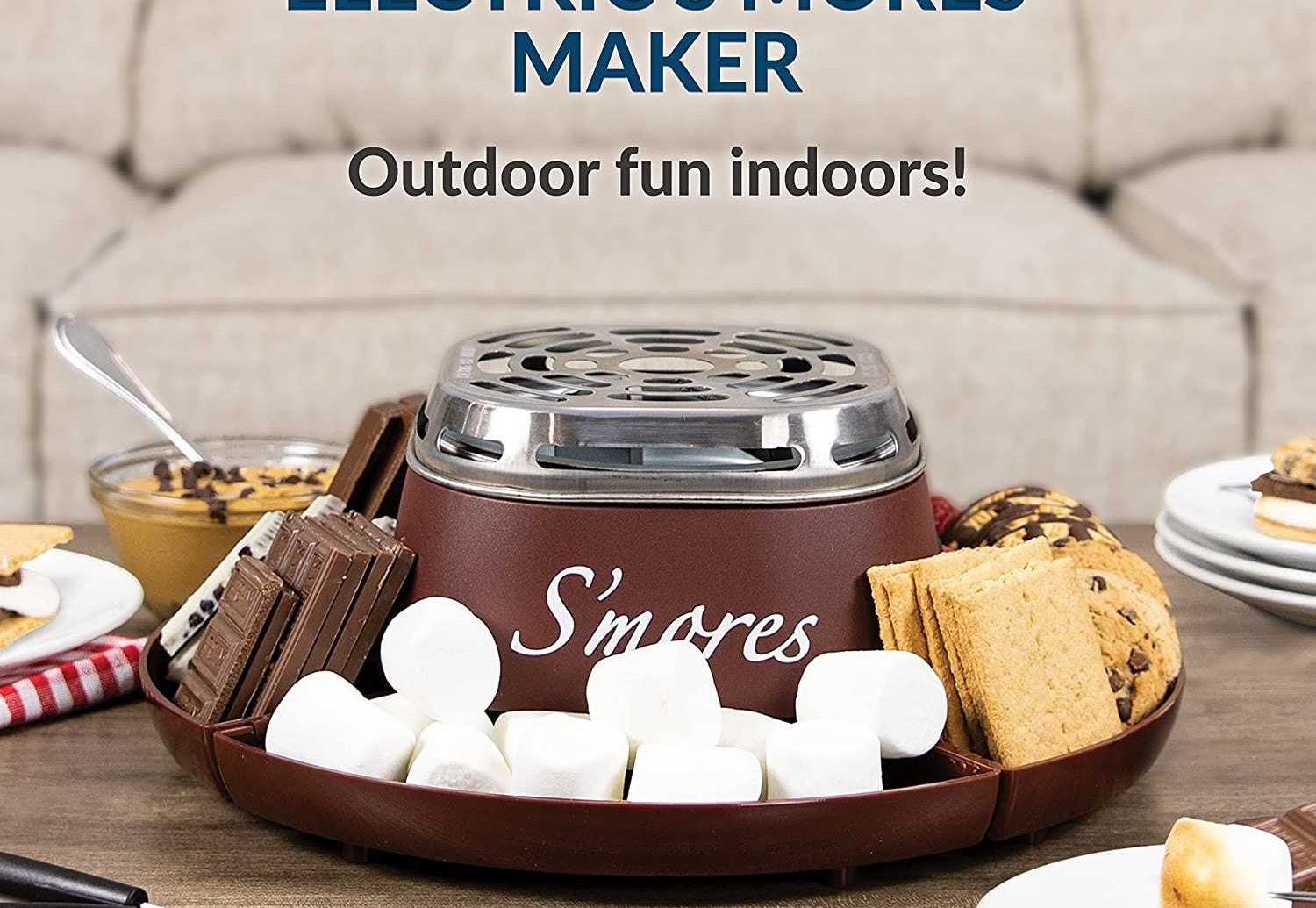 a tabletop smores kit with marshmallows, chocolate, and cookies arranged around the outside
