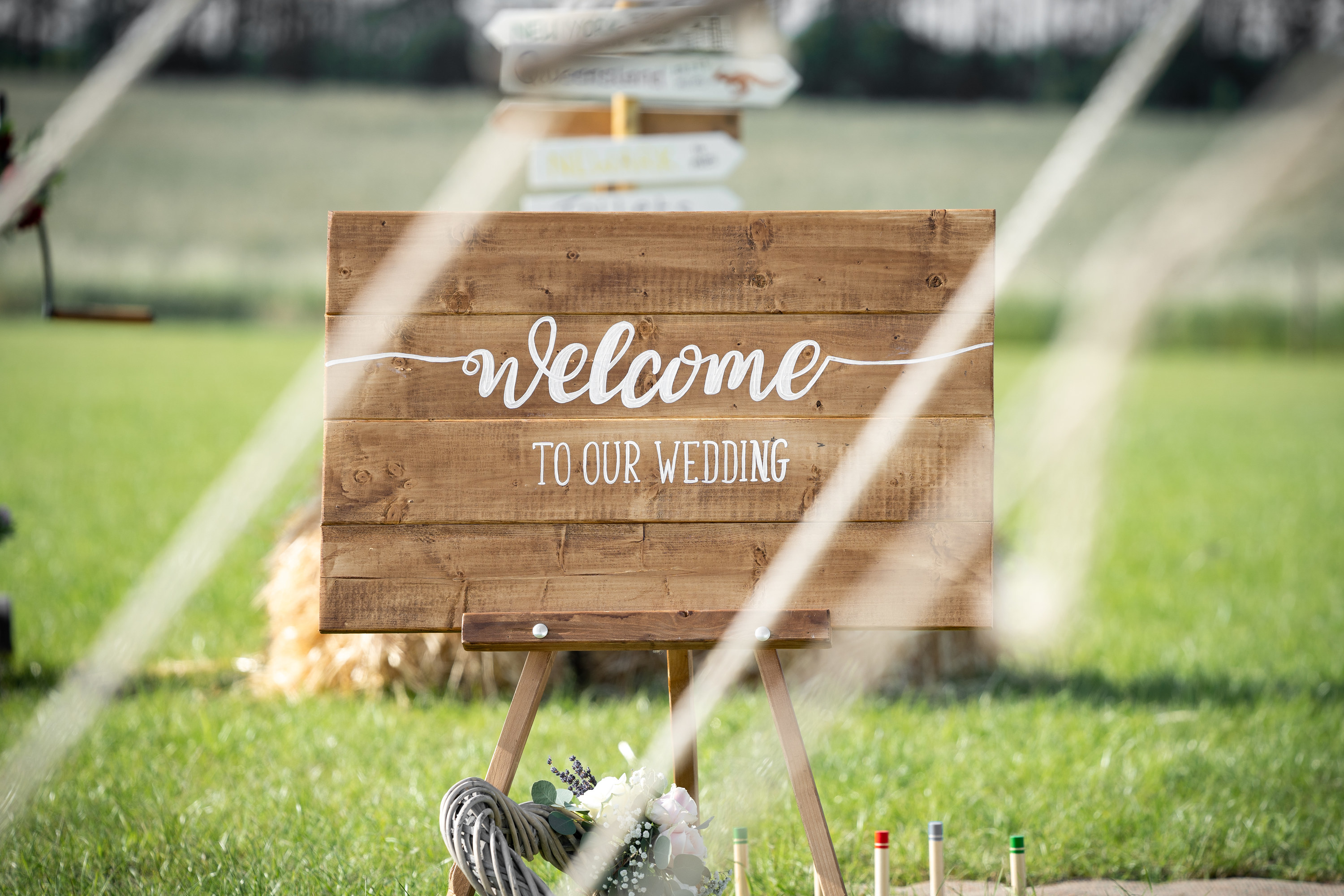 A welcome sign that reads, &quot;Welcome to our wedding&quot;